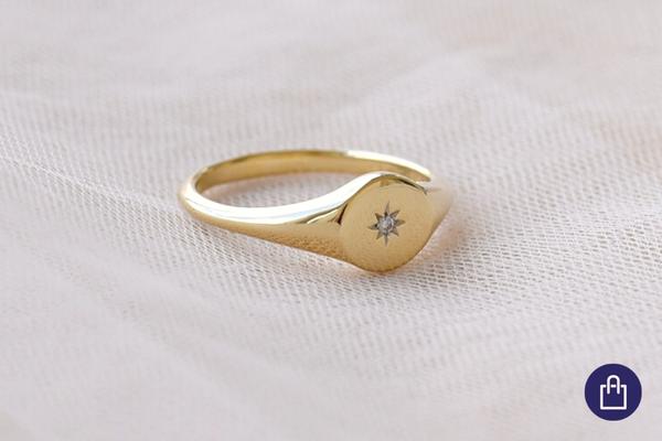 Zlatý pečetní prsten s hvězdou a diamantem