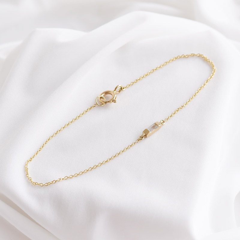 Zlatá kolekce s bílými baguette safíry Chanelle 94800