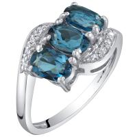 Zlatý prsten s modrými oválnými topazy a diamanty Cass