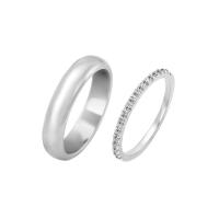 Platinový eternity prsten s diamanty a pánský půlkulatý snubní prsten Otila
