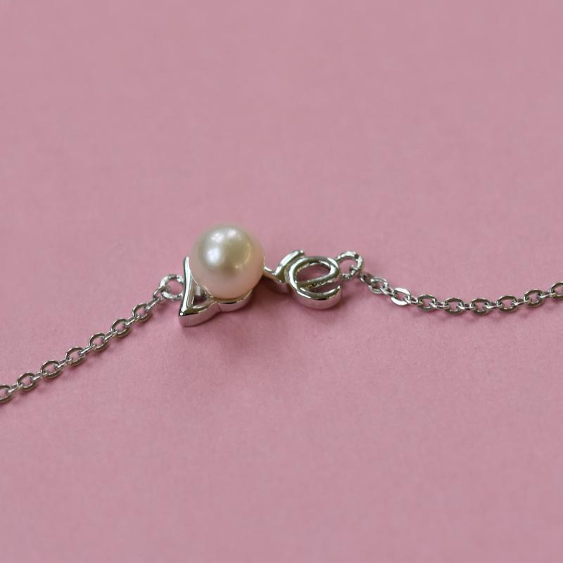 Stříbrný náhrdelník s bílou perlou 14552