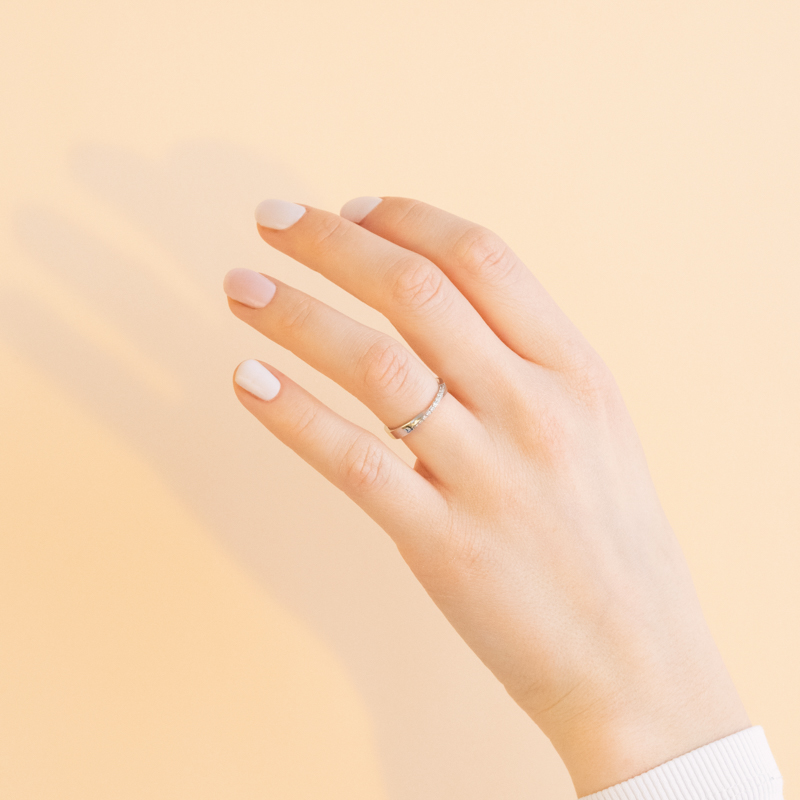 Zlatý propletený prsten s diamanty Brielle 100933