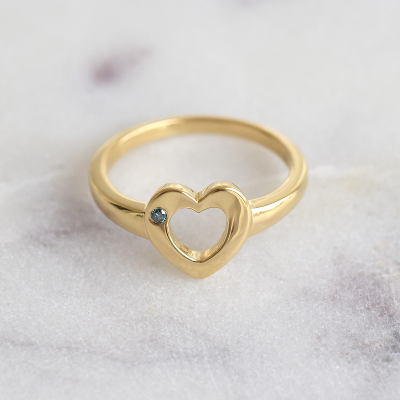 Pozlacený prsten s modrým diamantem