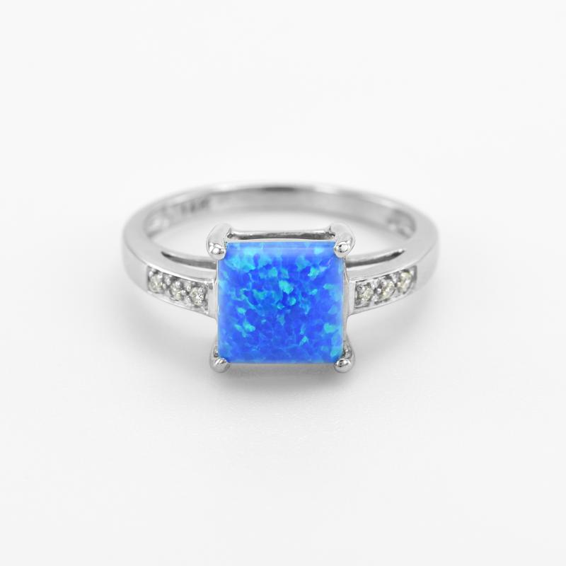Prsten s modrým opálem a diamanty 46684