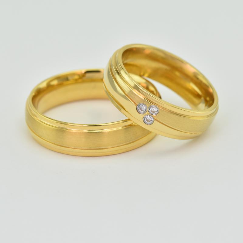 Zlaté snubní prsteny s diamanty 21905