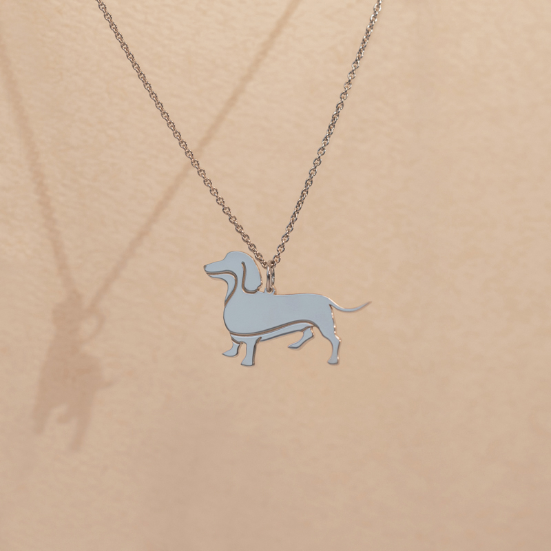 Stříbrný přívěsek ve tvaru psa s gravírem Dachshund 98595