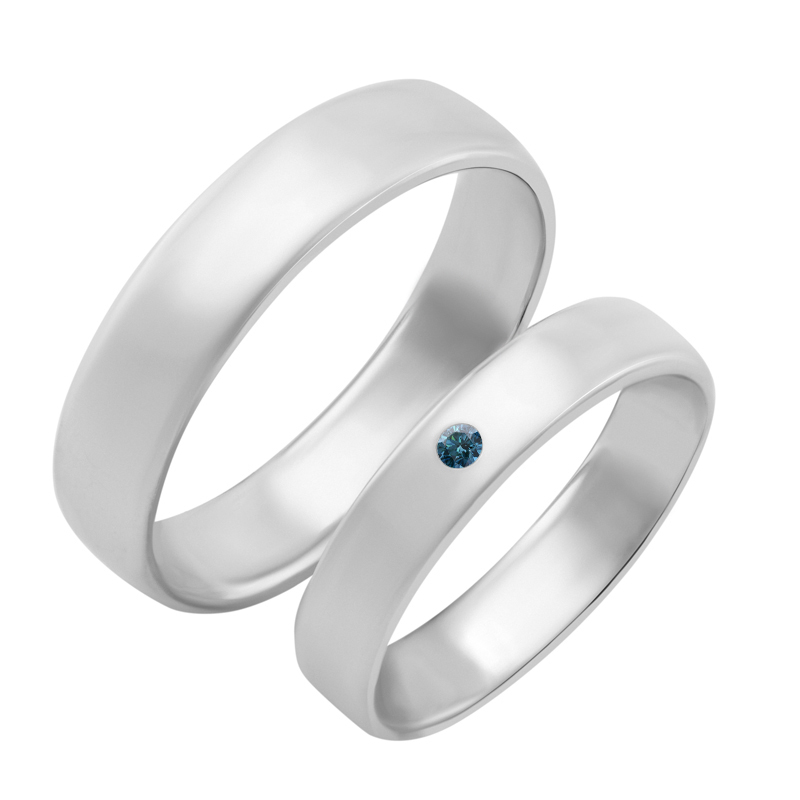 Zlaté snubní prsteny s modrým diamantem