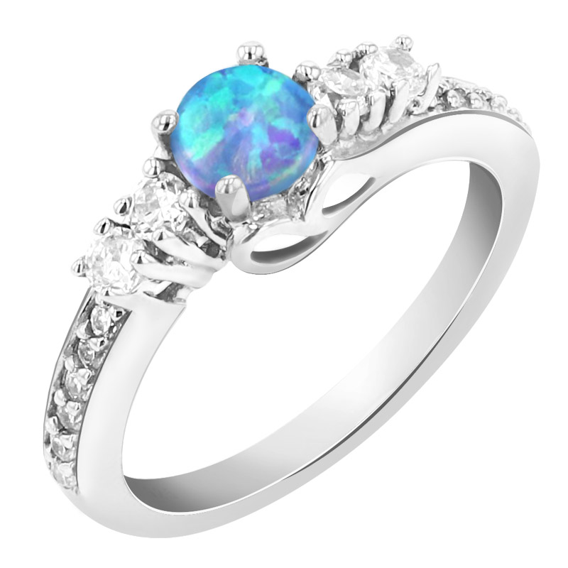 Stříbrný prsten s modrým opálem a zirkony