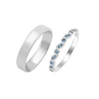 Zlatý snubní prsten s modrými diamanty a pánský komfortní prsten Alkeso