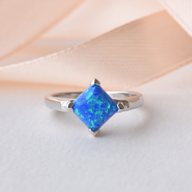 Stříbrný prsten s modrým opálem 78518