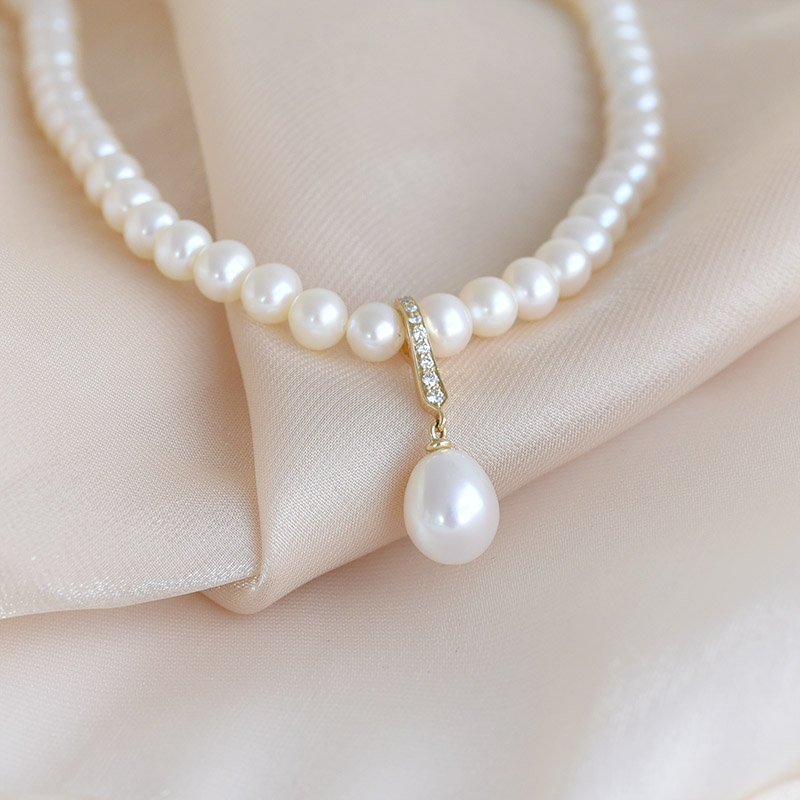 Zlatý perlový náhrdelník s diamanty 93508