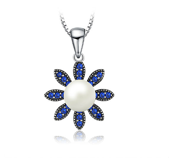 Stříbrná kytička tvořená perlou a modrými spinely Miri